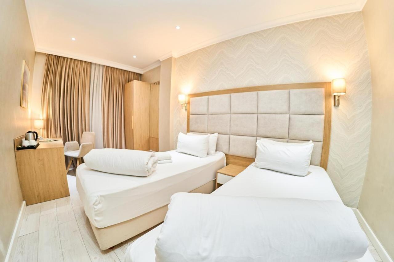 Edem Hotel Turkistan Quarto foto
